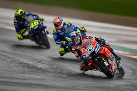 Motogp Valencia Andrea Dovizioso Takes Victory In Wild Rain Hit Finale Motogp Valencia Motogp Racing Bikes