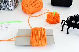 What can you do with pom poms? 2 Ways To Make Halloween Pom Pom Creatures Make And Takes
