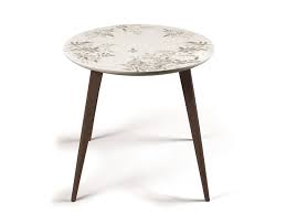What kind of wood is a coffee table made of? Round Porcelain Coffee Table Shadow Moment Wenge Moment Collection By Lladro