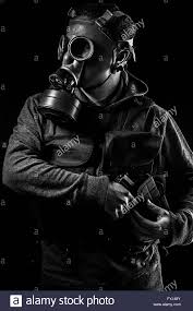Toxic Attack A Man In A Gas Mask In The Smoke Artistic Background Stock Photo Gas Mask Gas Mask
