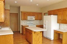 I changed to a wood hood and retrofitted a cabinet with plate rail and spice boxes. Picking Quartz To Go With Oak