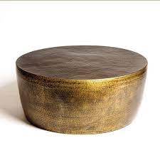 Vintage low table with geometric flower pattern metal liquid brass surface for antique loft decor handycor 5 out of 5 stars (154) sale price $287.20 $ 287.20 $ 359.00 original price $359.00 (20%. Izmir Hammered Brass Cocktail Table Global Views Brass Round Coffee Table Gold Coffee Table Brass Cocktail Table