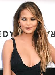 Chrissy teigen is often spotted wearing her hair in loose, literally perfect beachy waves, but tonight for the oscars, she showed up with the coolest braid (or, multiple braids) we've ever seen. Chrissy Teigen Beauty Riot