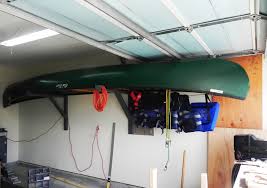 How To Hang A 17 Ft Canoe In A 19 Ft Garage The Canoe Is Just Low Enough Where The Garage Door Can Open And Close With Out Hitting Little Houses Canoe Hanging