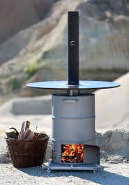 Ich baue ein fass aus drei alten paletten. Firemate Wie Sie Die Firemate Auch Immer Nennen Feuertonne Partyofen Oder Beheizbarer Stehtisch Die Fire Olfass Ofen Olfass Ofen Stehtisch Kochen Im Freien