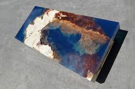 His lagoon series of tables combine natural stone and resin elements to mimic the pooling seas starting with a piece of marble from anguilla, resin with embedded led lights merge with the stone. Natural Stone And Resin Coffee Table Charismatic Planet
