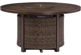 Fire pit tables are pretty much our favorite outdoor essential for any outdoor space. Signature Design By Ashley Paradise Trail Contemporary Round Fire Pit Table Lindy S Furniture Company Outdoor Fire Pits