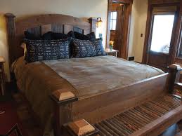 Primrose black metal king size bed frame (2) $ 279 99. Rustic Guest Room With Wooden King Size Bed Best King Size Bed Wooden King Size Bed King Size Bed Frame