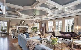 Two story living room with big stone fireplace and versatile gray painted walls. 15 Mansion Living Room Ideas Overflowing With Sophistication Home Design Lover