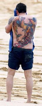 Ben affleck recently showcased his massive back tattoo in public two years after he called it fake, spurring a lot of feelings on twitter. Ultimate Ben Affleck Tattoo Guide All Tattoos What They Symbolize