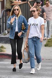 «we'll get a lot of weird t shirts out of this mess. Olivia Wilde Dons Casual T Shirt And Jeans For Vegan Lunch In La T Shirt And Jeans Olivia Wilde Style Fashion