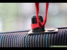 Once the knot is secure, pull the post upward to unlock the car. Jone Leaver How To How To Do Anything How To Unlock A Car Door How To Open A Locked Car Door