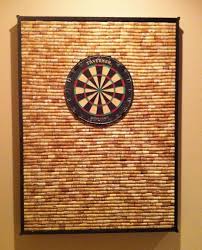 Use a cordless drill to secure the cabinet using the provided screws. Protect Your Wall From Stray Darts With This Diy Dartboard Cabinet Made Of Wine Corks Macgyverisms Wonderhowto