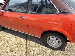 Image result for Orange 1977 Colt