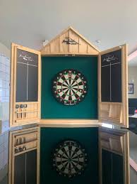 This custom oak handmade dartboard cabinet would be a classy addition to any game room or man cave. Custom Dartboard Cabinet Sign It Signs Queenstown Nz Facebook