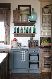 Slate Gray Painted Alder Cabinets Mixed With Those Fashioned From Distressed Oak Keep The Kitchen Feeli Rustic Kitchen Cabinets Kitchen Cabinets Rustic Kitchen
