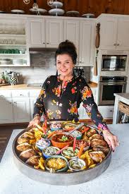 To start making this cheesy potato casserole, grab a bag of thawed hash brown potatoes. Epic Baked Potato Dinner Board Reluctant Entertainer