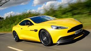 Image result for Sunburst Yellow 2017 Aston Martin