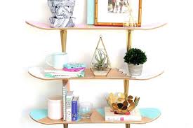 I cut four 10″ by 6″ stretcher for the back and then screwed them into place. Diy Skateboard Deck Shelf Upcycle Hometalk