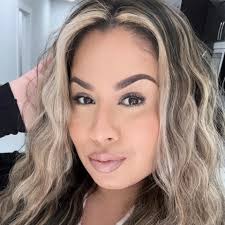 When should I schedule a trial with the makeup artist I've found,  considering the wedding is in 7 months? She's already sent me the wedding  day invoice, but I'm worried that if