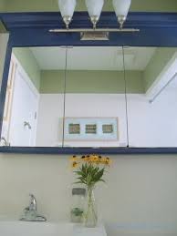 The mirror slides to the side to access the. How To Update A Medicine Cabinet Without Replacing It Frugal Family Times