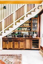 With These Rustic Bar Ideas Your Home Can Feel Like The Perfect Country Speakeasy Hunker Bar Under Stairs Living Room Bar Under Stairs