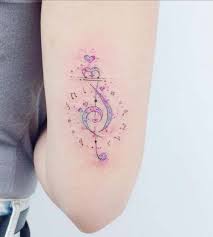 kadin arka kol renkli nota dovmesi woman arm back musical notes tattoo dovmeli kadin dovme mini tattoos