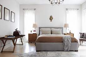 It is illuminated by black sconces and a clad in brown floral wallpaper, this bedroom boasts a cleopatra bed accented by gray draperies. Gray And Brown Bedroom Contemporary Bedroom Simo Design