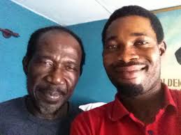 Bokaye, a wonderful singer and master of the harp of Gabon, known as  ngombi, displaying his formidable skills.