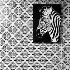 かまぼこ on instagram マイナーな100均に売っていたテーブルクロスを壁に貼ったらいい感じになりました 大昔にサンキューマートで買ったシマウマが映える モノトーン 壁紙 テーブルクロス 白黒 シマウマ ゼブラ ダマスク柄