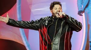 He is also the brother of renowned british singer and songwriter john. Vw9mdk1h Kjj2m