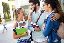Happy University Friends Studying Together In College Happy Friends University Happy