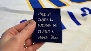 A local company designed pennants and patches for RJ's special night