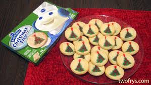 For each cookie, overlap ends of 1 green rope and 1 red rope 1/4 inch. Two Frys Pillsbury Christmas Tree Shape Sugar Cookies