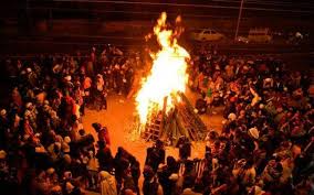 People gather together in the night and have a bonfire. Happy Lohri Beyond Bonfires And Popcorn Education Today News