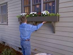 Window flower trough with lattice frame. How To Build A Window Box Planter How Tos Diy