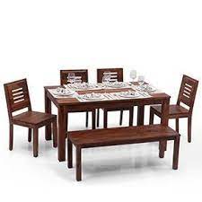 Large dining table made of teak wood as outdoor furniture for your patio dining table. Wooden Dining Table Buy Solid Wood Dining Table Sets Design Online In India Urban Ladder