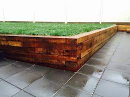 My Fabulous Retaining Wall Inspired By Other Walls I Found On Pinterest Fabul Garden Ideas Using Railway Sleepers Wooden Retaining Wall Timber Retaining Wall