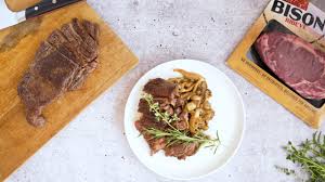 Place prepared steaks on the grill, close grill lid during grilling and follow cooking times below. Pan Seared High Plains Bison Ribeye Steak With Roasted Mushrooms High Plains Bison