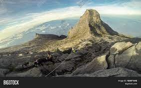 It is the worlds tallest mountain and immpossible to climb to the top without dying. View Top Low S Peak Image Photo Free Trial Bigstock