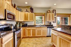 Vinegar is gentle enough to be used regularly on wood kitchen cabinets and strong enough to take down layers of grease, grime and hard water deposits. How To Clean Wooden Kitchen Cabinets Which Is The Best Way
