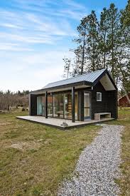 This Scandinavian Modern Tiny House In Denmark Has A 258 Sq Ft Studio Floor Plan With Sleeping Loft Www Facebook Com Smallhousebliss Modern Tiny House Tiny House Design Minimalist House Design