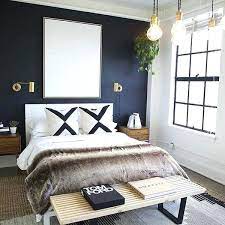 Creating an accent wall can add playfulness that attracts the eye and makes a room feel polished. These Dark Accent Walls Break All The Small Space Design Rules