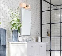 Cast of steel with polished nickel finish. Kensington Pivot Rectangular Wall Mirror Pottery Barn