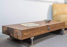 The coffee table pictured has no stain, just clear polyurethane on the natural weathered pallet wood. Flatcar Coffee Table
