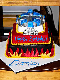 I put a small circle of black fondant down on top of the cake before i rolled out/covered with the yellow fondant. Transformer Cakes Decoration Ideas Little Birthday Cakes