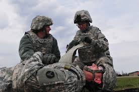 Spc. Kelsey Moriarity and Spc. Sarah Stuhrk, soldiers