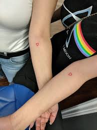 Heart Tattoo On Inner Arm In Red Ink Red Heart Tattoos Small Heart Tattoos Red Ink Tattoos