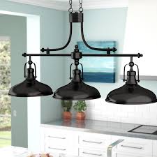 Above the island are two unique, silver pendant lights situated behind an exposed wood header. 3 Light Kitchen Island Pendant Interior Design Kitchen Modern Kitchen Kitchen Lighting