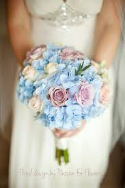 Find light blue flowers at fiftyflowers! Bouquets Light Blue Hydrangea Bouquet Country Wedding Bouquet Peony Bouquet Peach Roses Garden Blue Hydrangeas Pink Roses Blue And Peach Weddings